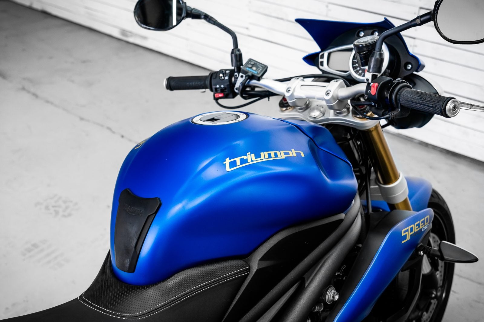 2014 Triumph Speed Triple 1050 ABS in Satin Blue - tank and handlebars