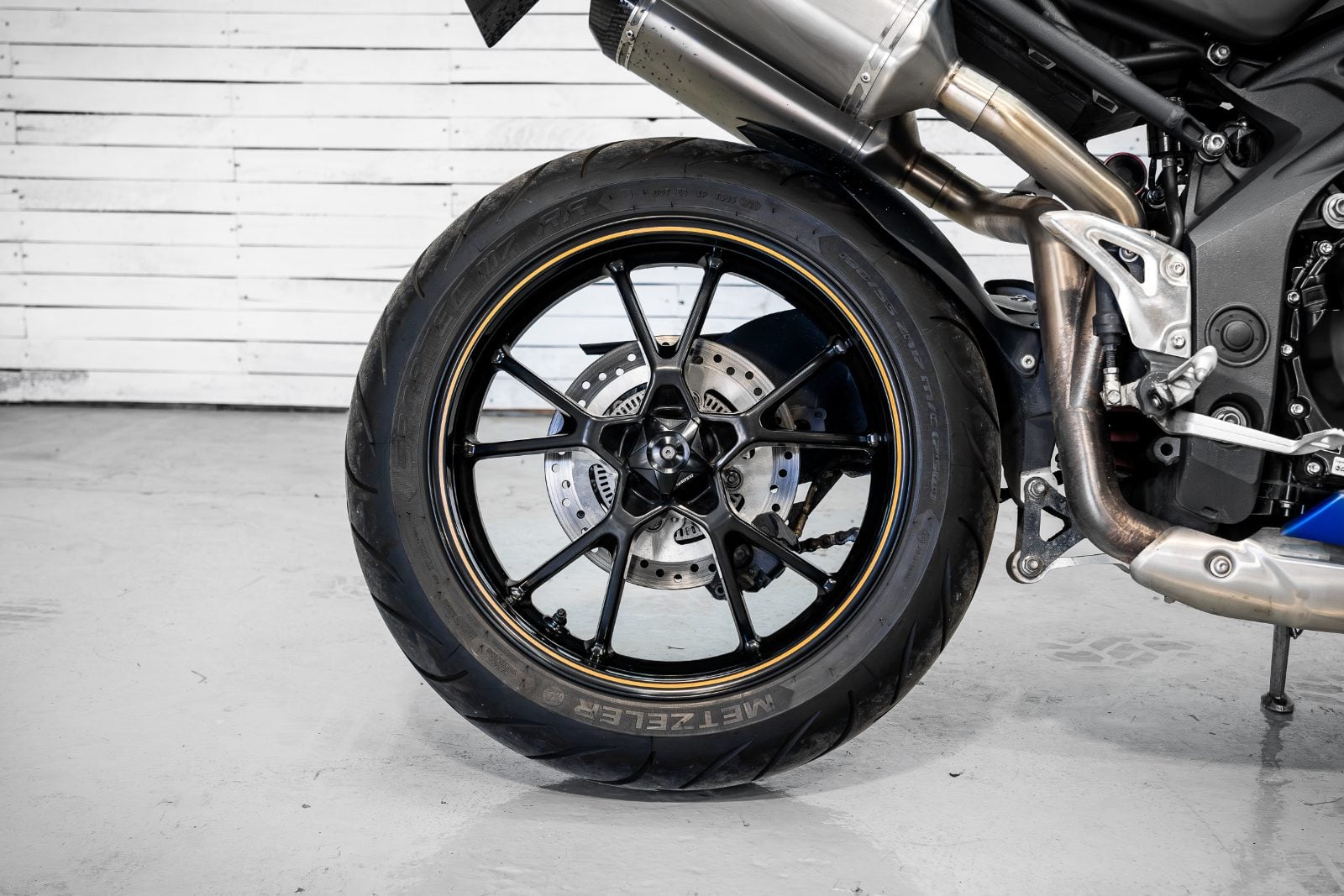 2014 Triumph Speed Triple 1050 ABS in Satin Blue - rear wheel detail