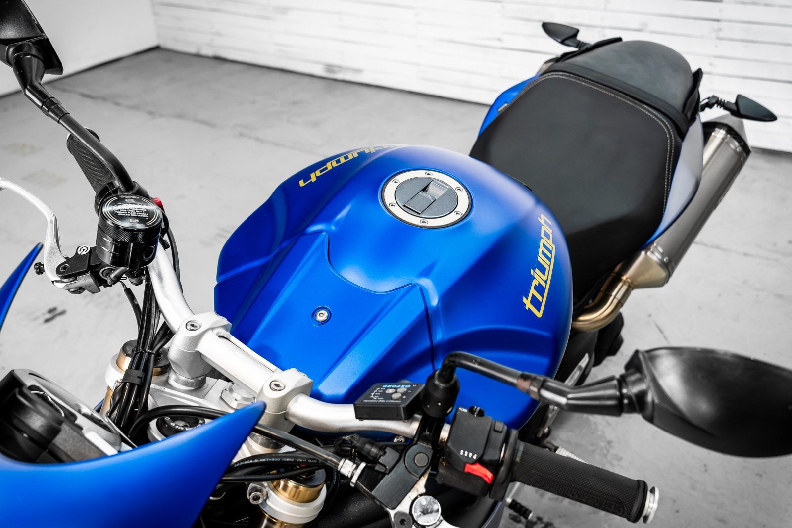 2014 Triumph Speed Triple 1050 ABS in Satin Blue - tank and cockpit from above