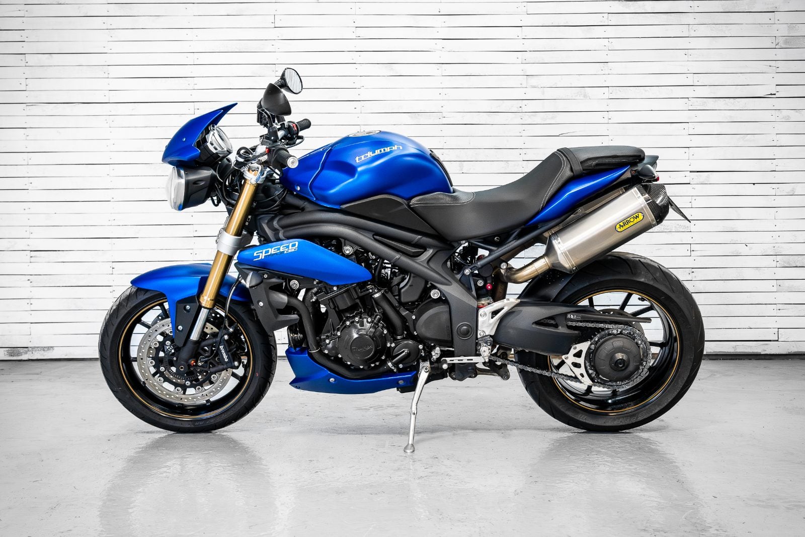 2014 Triumph Speed Triple 1050 ABS in Satin Blue - left side profile