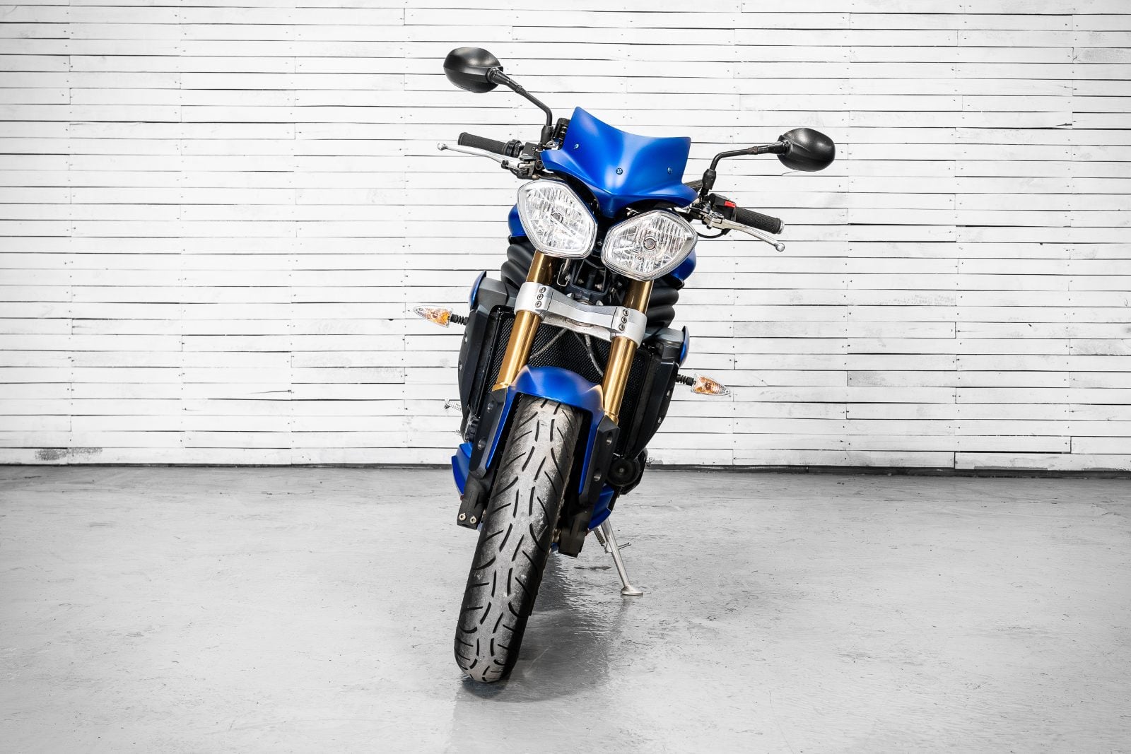 2014 Triumph Speed Triple 1050 ABS in Satin Blue - head-on front