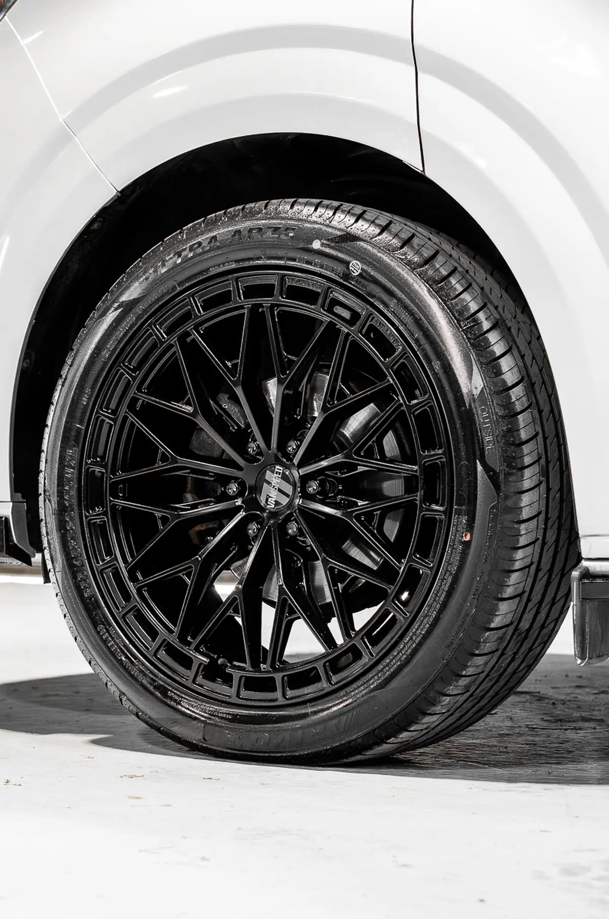 Black load-rated alloy wheel on a Ford Transit Custom