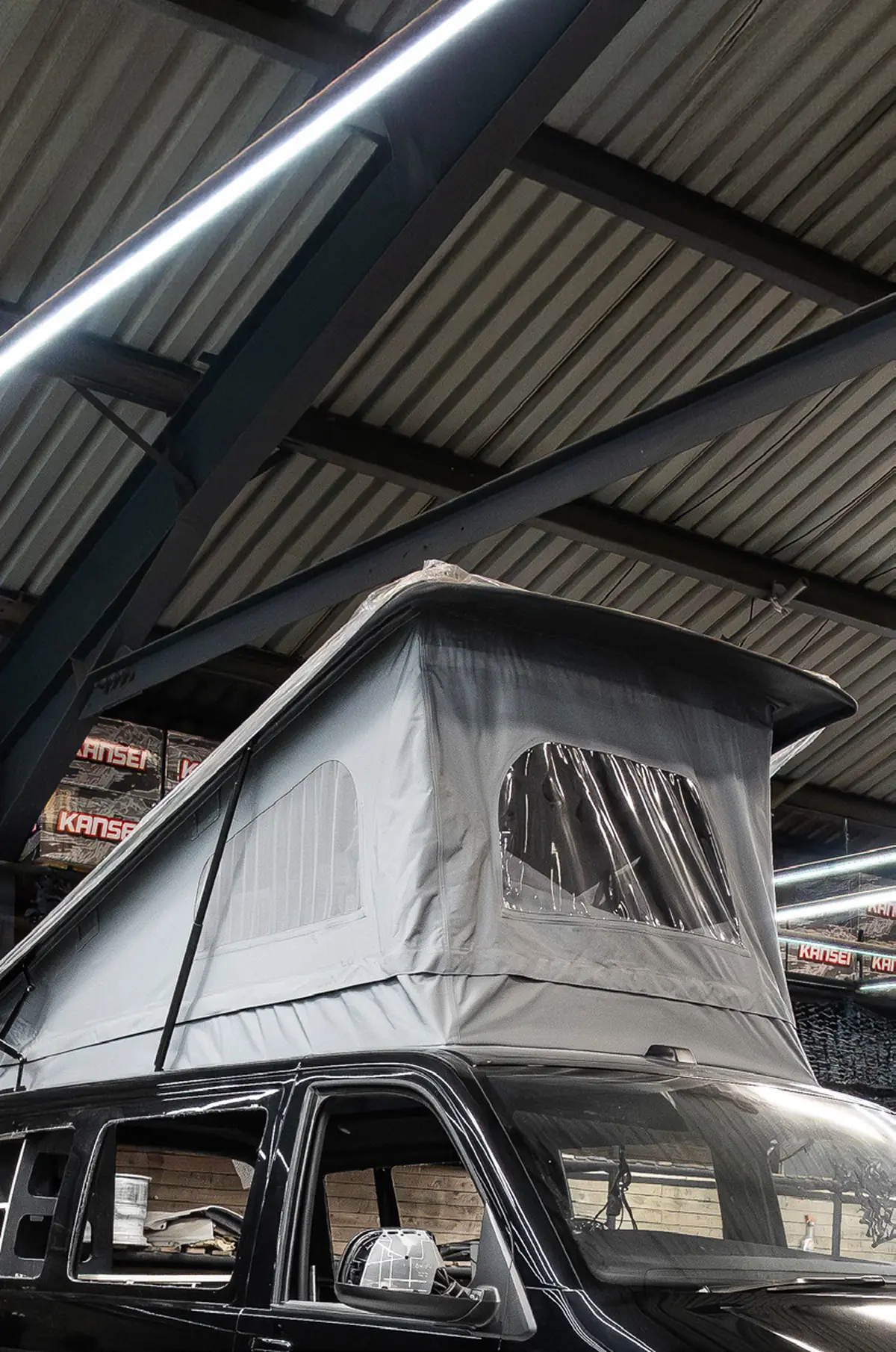 Pop top roof conversion on a van in the MDK workshop