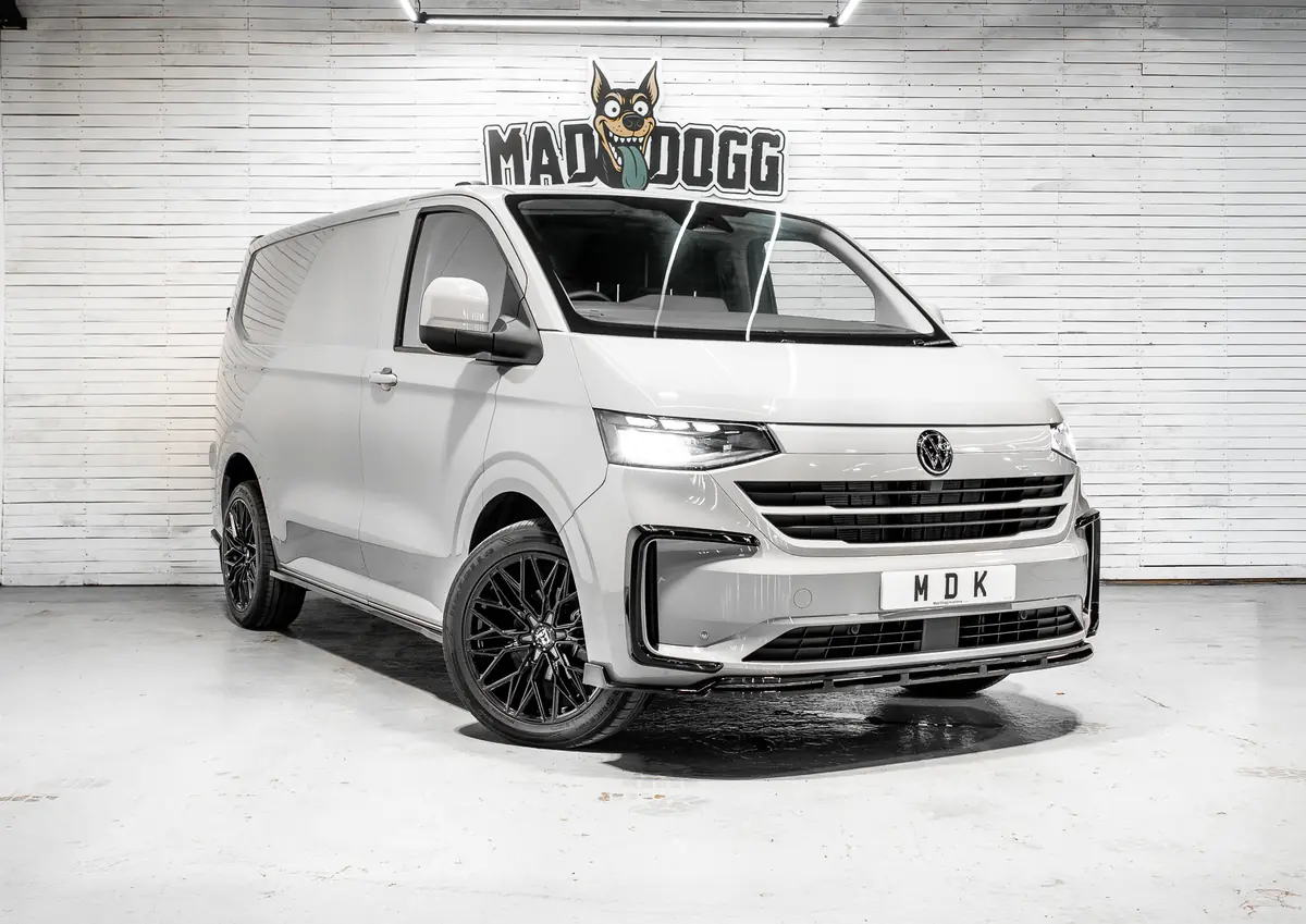 White VW Transporter T7 with body kit and black alloys